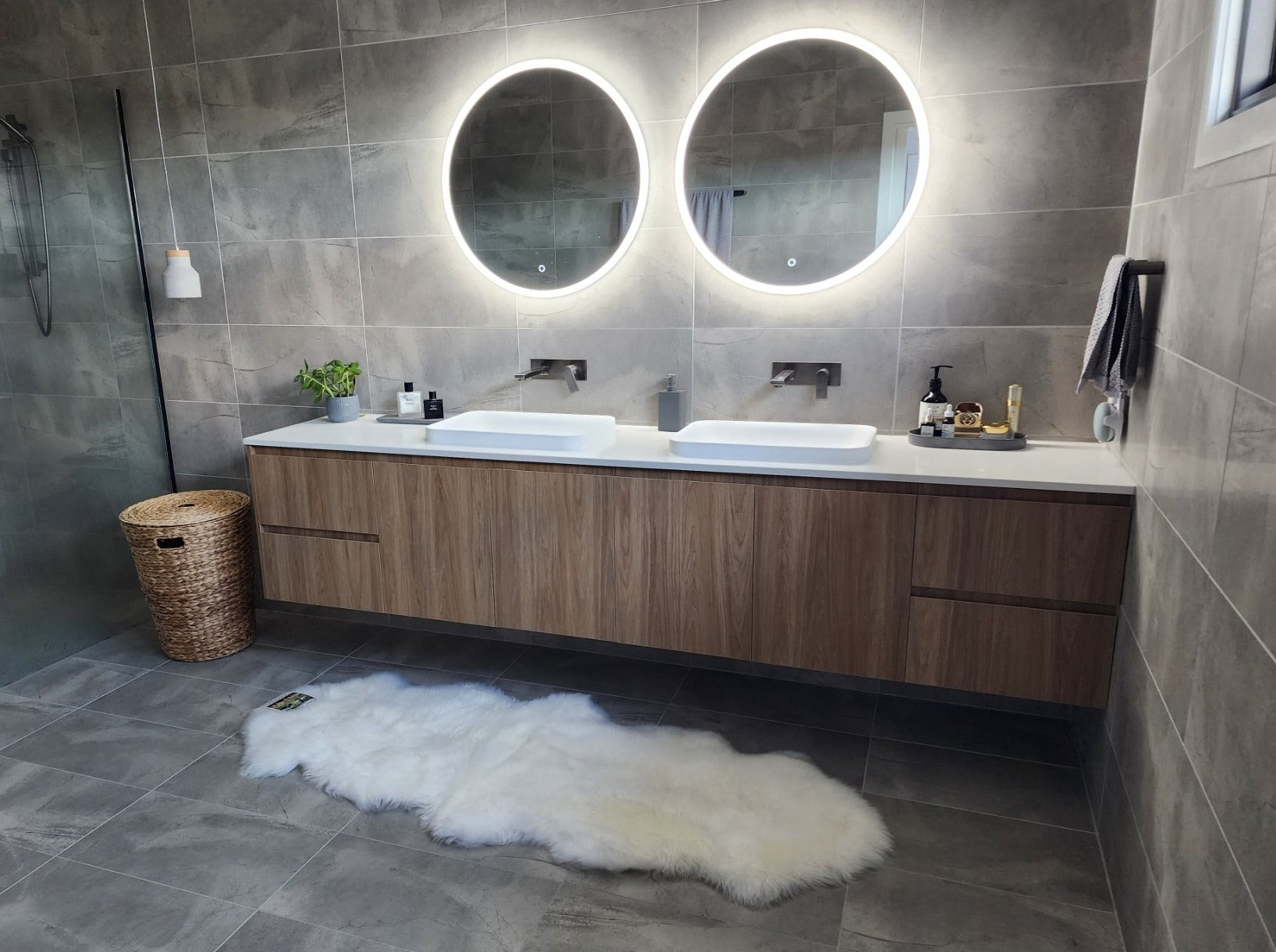 white sheepskin rug floor mat in bathroom