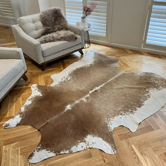     lana brown cowhide rug on lounge living room floor