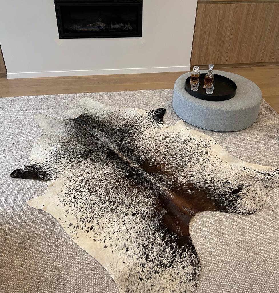 premium cowhide rug in living room home decor